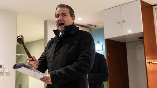 The auction of a one-bedroom apartment in Surry Hills.