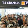Passengers queuing at Melbourne Airport on Saturday after the Airbus warning.
