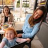 Ruby Davies-Nelson with daughter Bonnie and friend Susannah McCaughan at Cafe Jack’s in Kensington. Both mothers manage screen time with other activities when dining out.
