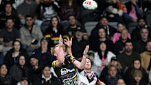 Mark Nawaqanitawase and Tom Jenkins contest for the ball in the air.
