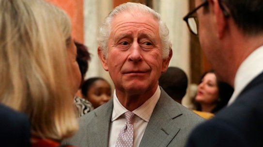 King Charles III speaks to guests during a reception at Buckingham Palace this week.