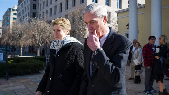 Special Counsel Robert Mueller and his wife Ann depart St John's Episcopal Church, across from the White House.