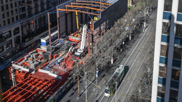 Construction of the Metro Tunnel's Town Hall station at City Square. The acoustic shed is partly built.