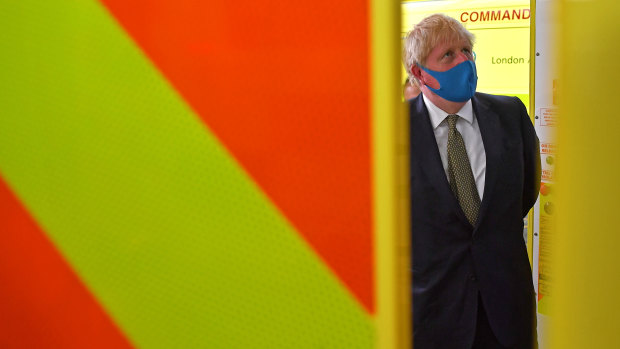 Boris Johnson wears a mask on Monday during a visit to the London Ambulance Service NHS Trust.