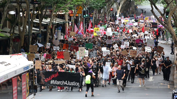 Thousands march through Brisbane.