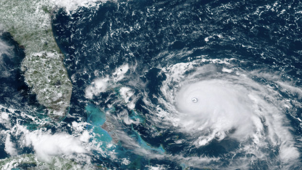A satellite image of Hurricane Dorian as it bore down on the Bahamas on Saturday, local time.