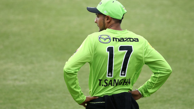 Tanveer Sangha of the Thunder looks on during the Big Bash League match between the Melbourne Stars and Sydney Thunder.