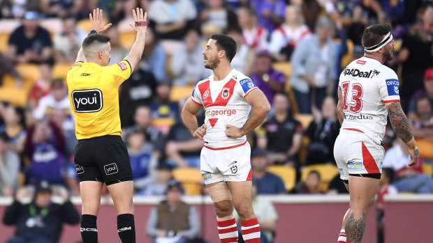 Josh McGuire of the Dragons is sin-binned for a high shot on Justin Olam.