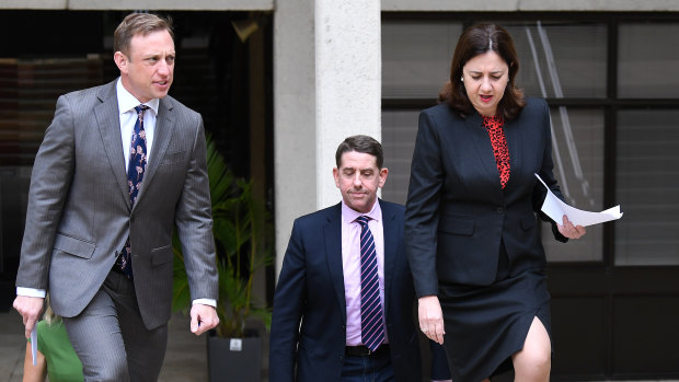 Premier Annastacia Palaszczuk with Steven Miles and Cameron Dick at yesterday's cabinet announcement.