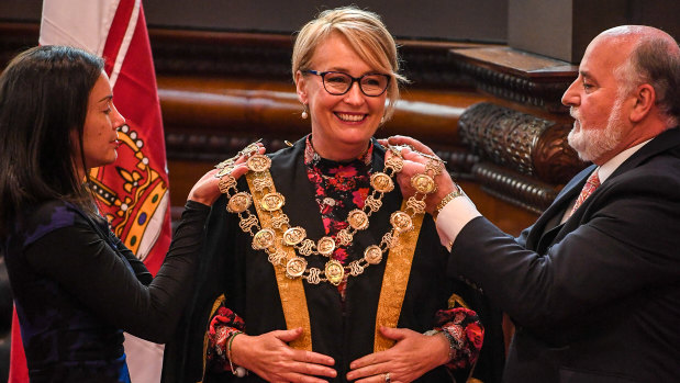 Sally Capp dons the mayoral chains after being elected Melbourne lord mayor at the May by-election.
