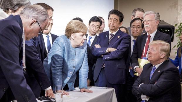 German Chancellor Angela Merkel addresses Donald Trump in Quebec. 