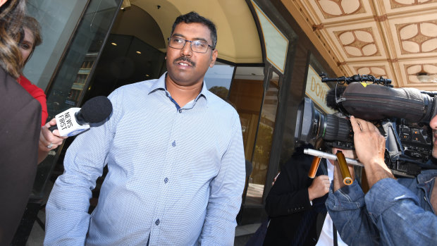 Courier driver Dinkar Tayi leaves the Downing Centre court in Sydney on Thursday. 