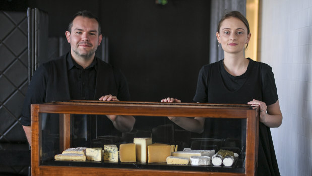 Renato Pagliardi and Bronte Millington presenting Vue de Monde's all-Australian cheese trolley. 