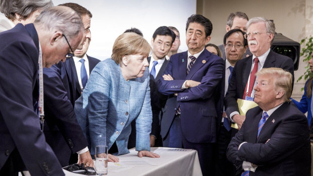 German Chancellor Angela Merkel addresses Donald Trump in Quebec. 