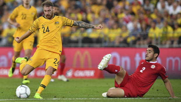 Martin Boyle (left) scores against Lebanon during the International friendly match between Australia and Lebanon at ANZ Stadium.