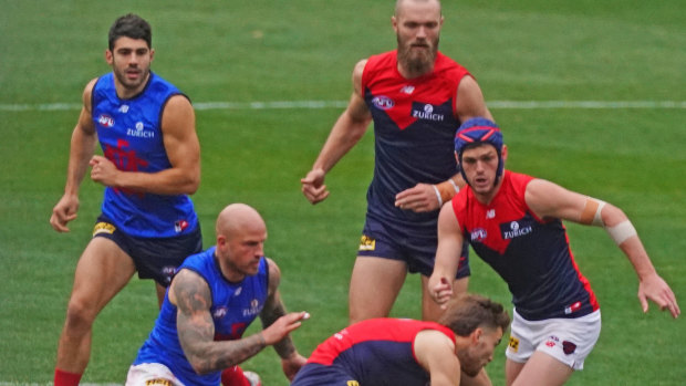 Scratch match: Christian Petracca, Nathan Jones, Jack Viney, Max Gawn  and Angus Brayshaw compete for the ball during a Melbourne Demons intraclub match at the MCG on Sunday.