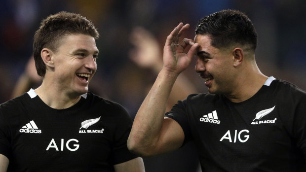 One-sided: New Zealand's Beauden Barrett (left) and Anton Lienert-Brown celebrate after the thrashing of Italy.