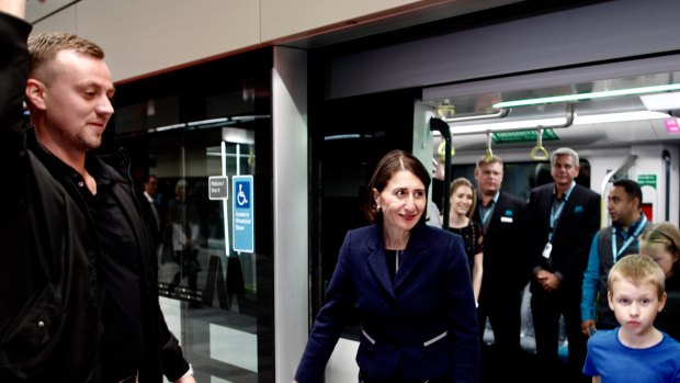 NSW Premier Gladys Berejiklian met workers and their families who built the $7.3 billion northwest metro rail link.