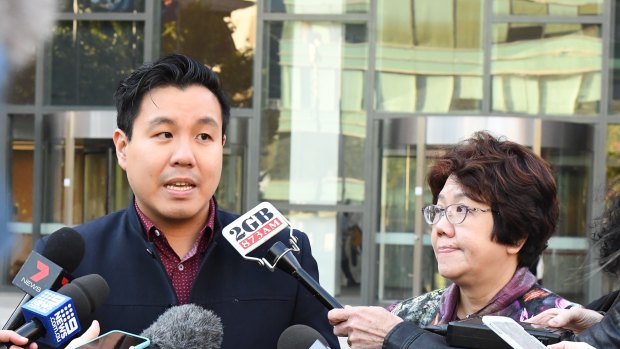 Alpha Cheng and his mother outside court after the person who supplied the gun that killed his father was sentenced.