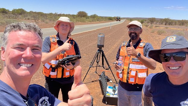 Bravo team leader Jason Paull, left, ANSTO senior associate physicist Dr Lachlan Chartier, ANSTO radiological emergency manager Prashant Maharaj and DFES search team member Dom Reay celebrate when it was confirmed they had found the capsule.