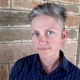 Jennifer Mills says she hopes fiction can help people work through their fear and anger over climate change. 