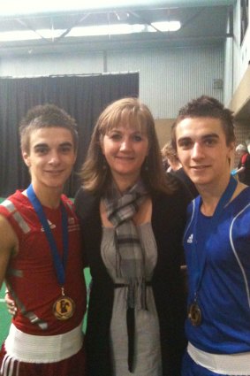 A young Andrew and Jason Moloney with mum Tracey Guest.