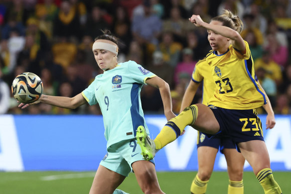 Caitlin Foord played with a heavily bandaged head after a clash with Kosovare Asllani.