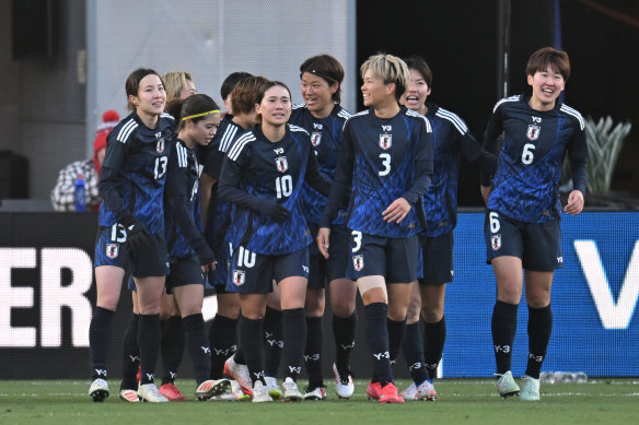 Maika Hamano and teammates celebrate.