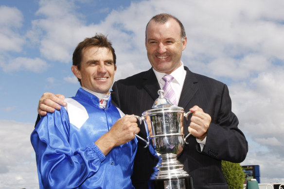David Hayes and jockey Dwayne Dunn celebrate Reaan’s Blue Diamond win of 2008.
