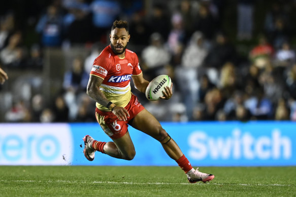 Hamiso Tabuai-Fidow in full flight for the Dolphins against the Cronulla Sharks.