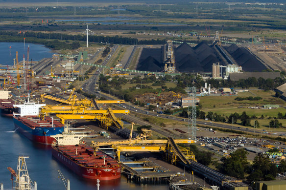 Coal carriers are loaded at the Port of Newcastle.