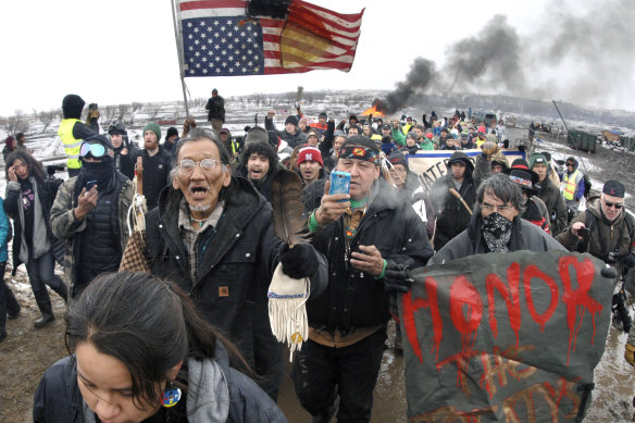 People protest the Dakota Access Pipeline in 2017. Donald Trump approved both the Dakota and Keystone projects. 