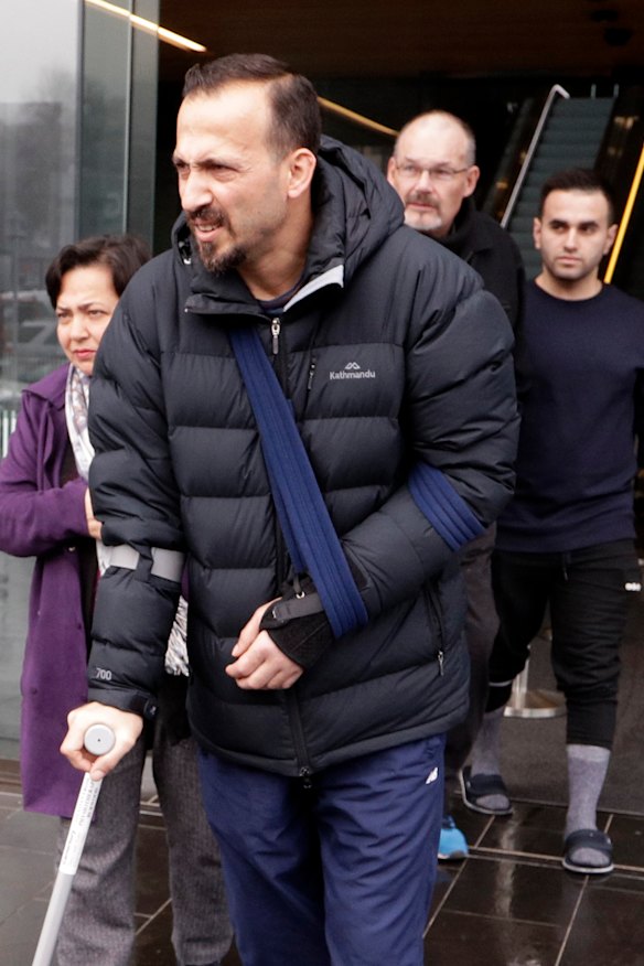 Temel Atacocugu, a victim of the Christchurch mosque shootings, leaves court in Christchurch last year.