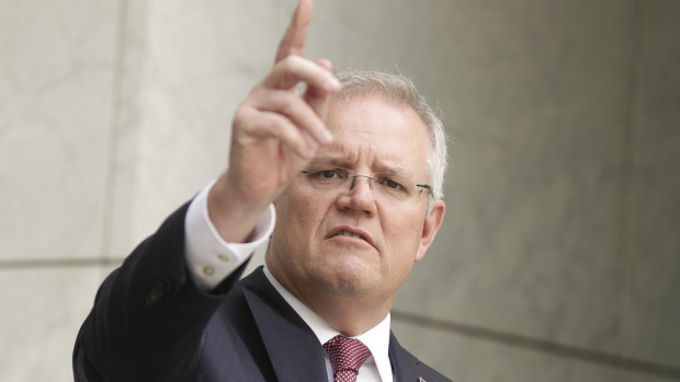 Prime Minister Scott Morrison addresses the media on COVID-19 coronavirus during a press conference at Parliament House in Canberra on  Sunday 29 March 2020. 