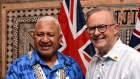 Fiji Prime Minister Frank Bainimarama with Prime Minister Anthony Albanese in Suva  in July. 