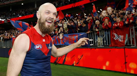 Melbourne skipper Max Gawn celebrates with fans.