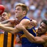 MELBOURNE, AUSTRALIA - OCTOBER 03:  Brad Sheppard of the Eagles handballs whilst being tackled by Bradley Hill and Cyril Rioli of the Hawks  during the 2015 AFL Grand Final match between the Hawthorn Hawks and the West Coast Eagles at Melbourne Cricket Ground on October 3, 2015 in Melbourne, Australia.  (Photo by Quinn Rooney/Getty Images)