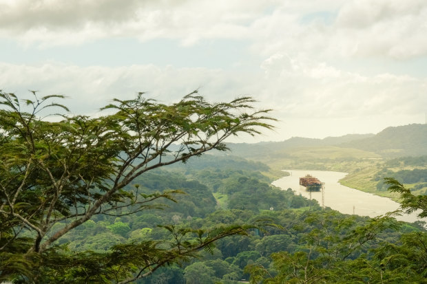 A cargo boat moves along the Panama Canal in 2018.