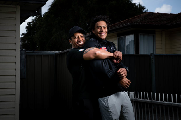 Martin Luai, who was released from prison in April, with his son Jarome at the front of their Dharruk home.