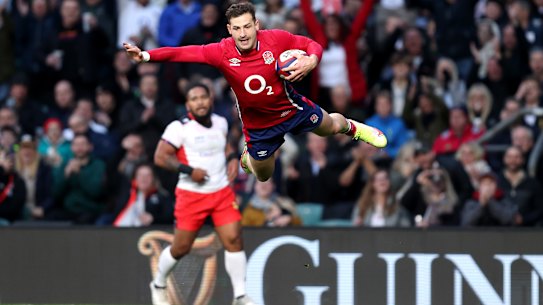 LONDON, ENGLAND - NOVEMBER 06: Jonny May of England dives over to score their side’s third try during the Autumn Nations Series match between England and Tonga at Twickenham Stadium on November 06, 2021 in London, England. (Photo by Julian Finney/Getty Images)