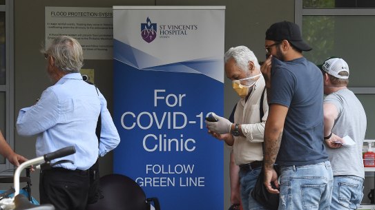 People queue at a coronavirus testing clinic St Vincent's Hospital in March.
