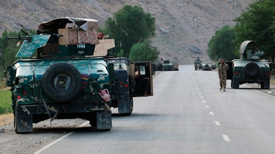 Feeling Afghan soldiers pause on a road at the front line of fighting between Taliban and security forces,  near the city of Badakhshan, northern Afghanistan on Sunday.