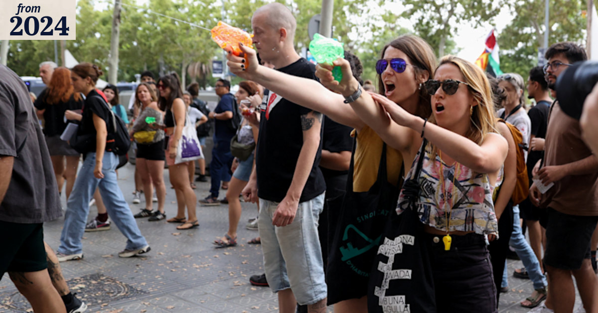 ?Tourism kills the city’: Protesters soak diners with water pistols