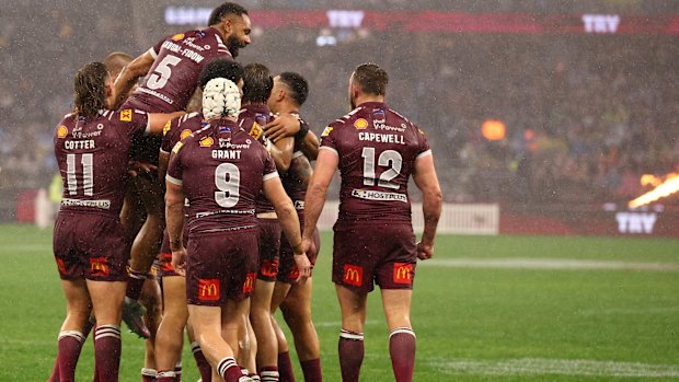 Queensland celebrate a first-half try.
