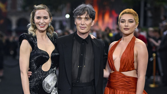 Emily Blunt (right), Cillian Murphy (centre) and Florence Pugh (left) at the “Oppenheimer” premiere in London on July 13, 2023. The actors left the event early, in support of the strike.