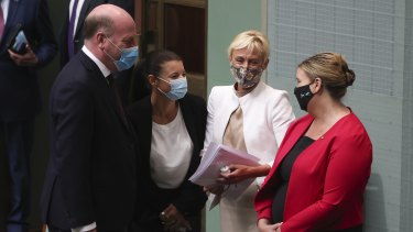 Liberal MPs Trent Zimmerman, Dr Fiona Martin, Dr Katie Allen and Bridget Archer, in the House of Representatives as it resumed sitting on Thursday morning.