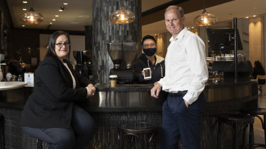 CBA general manager of merchant solutions Karen Last with group executive for business banking Mike Vacy-Lyle and Charles Wang, business owner at cafe Nevaggio.