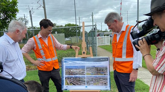 Qld senator Anthony Chisholm, state transport minister Bart Mellish and Sandgate MP Stirling Hinchliffe join Brisbane infrastructure chair Cr Andrew Wines at the start of work on the Beams Road level crossing overpass.