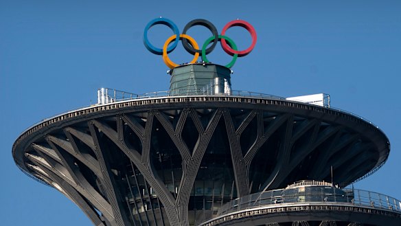 Olympic rings are visible atop the Olympic Tower in Beijing. 