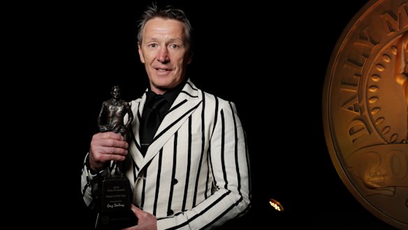 Craig Bellamy accepts the Dally M coach of the year award last October.